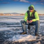 ©2020 Roland Taylor Ackley Lake State Park Ice Fishing Siting and Waiting for a Fish